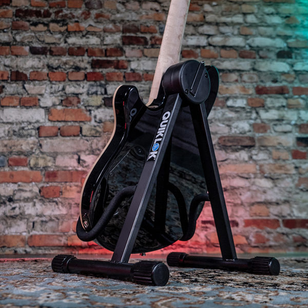 back of guitar stand with electric guitar
