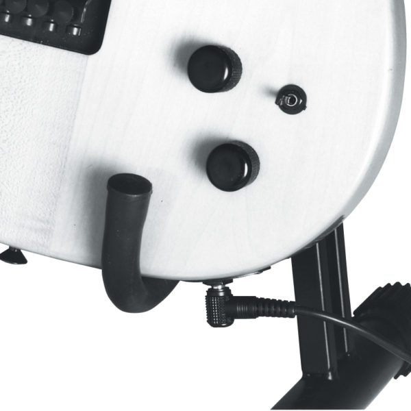 detail view of guitar stand with electric guitar